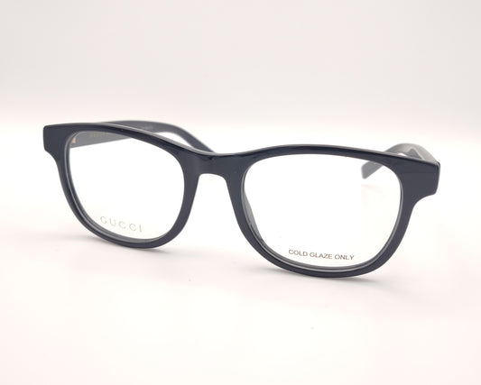 gafas gucci en pasta azul marino con logo dorado en las varillas