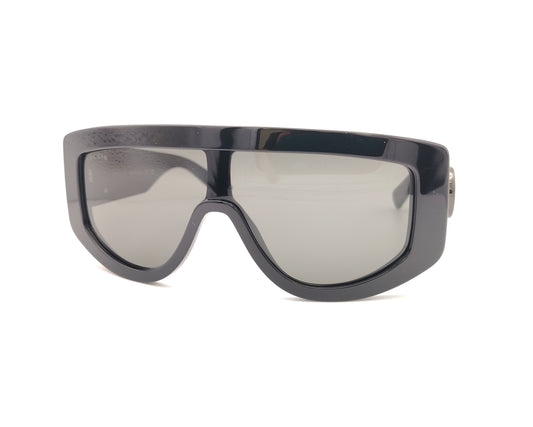 gafas de sol gucci tipo máscara negras con montura ancha y logo metálico gg en las varillas