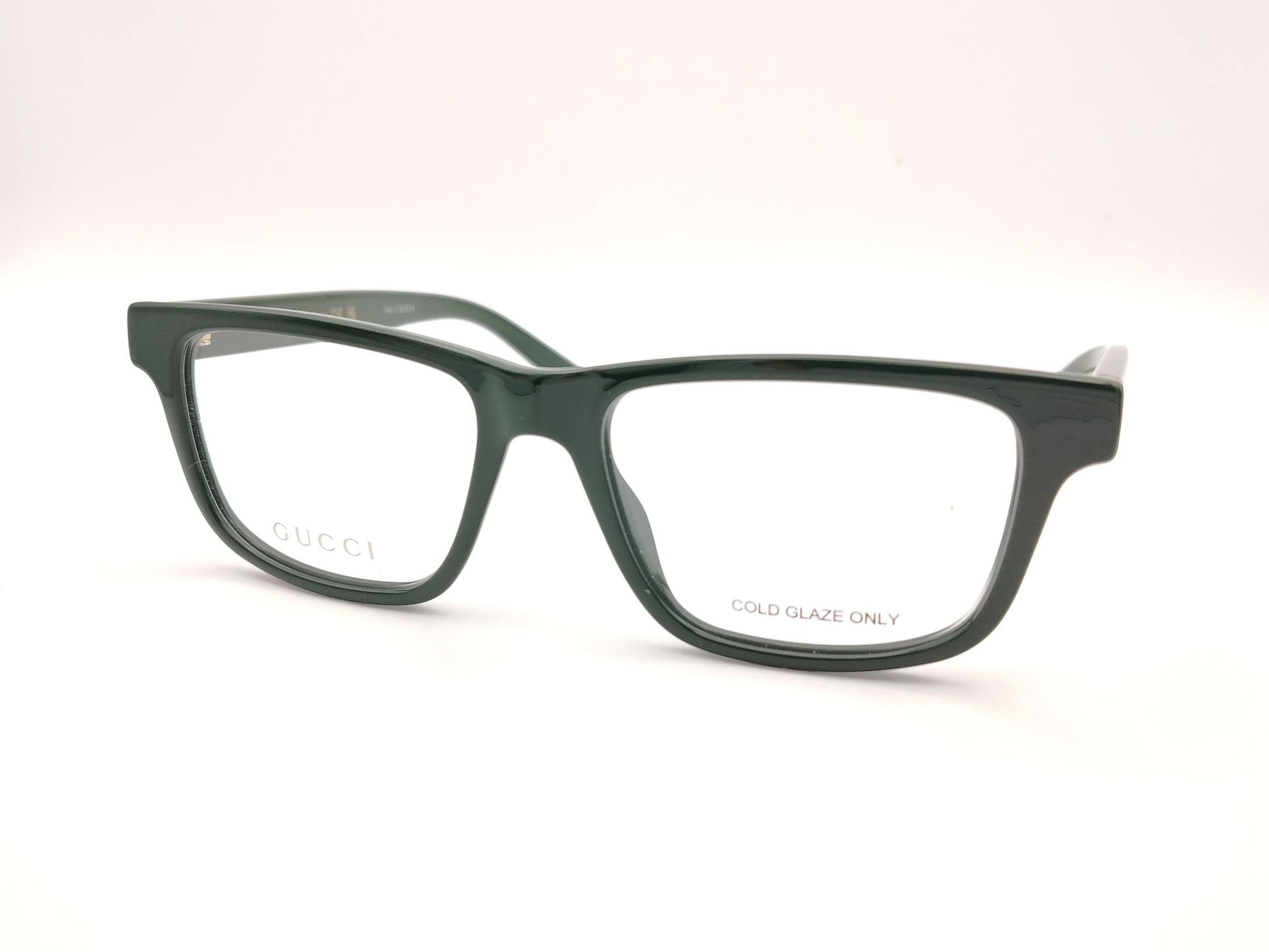 gafas gucci graduadas verde oscuro con forma rectangular y detalle tricolor en la varilla