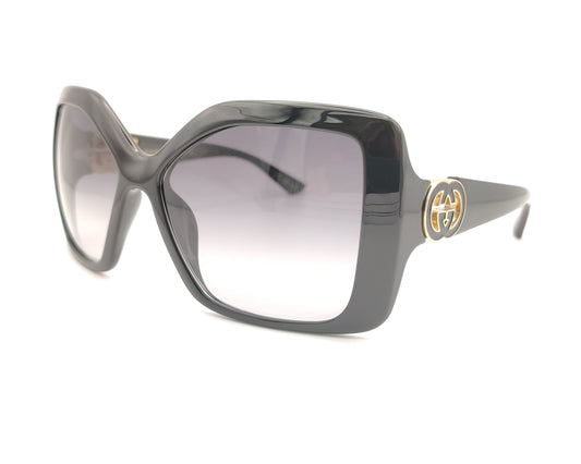 gafas de sol gucci cuadradas oversize negras con lentes grises degradadas y logo dorado en las patillas