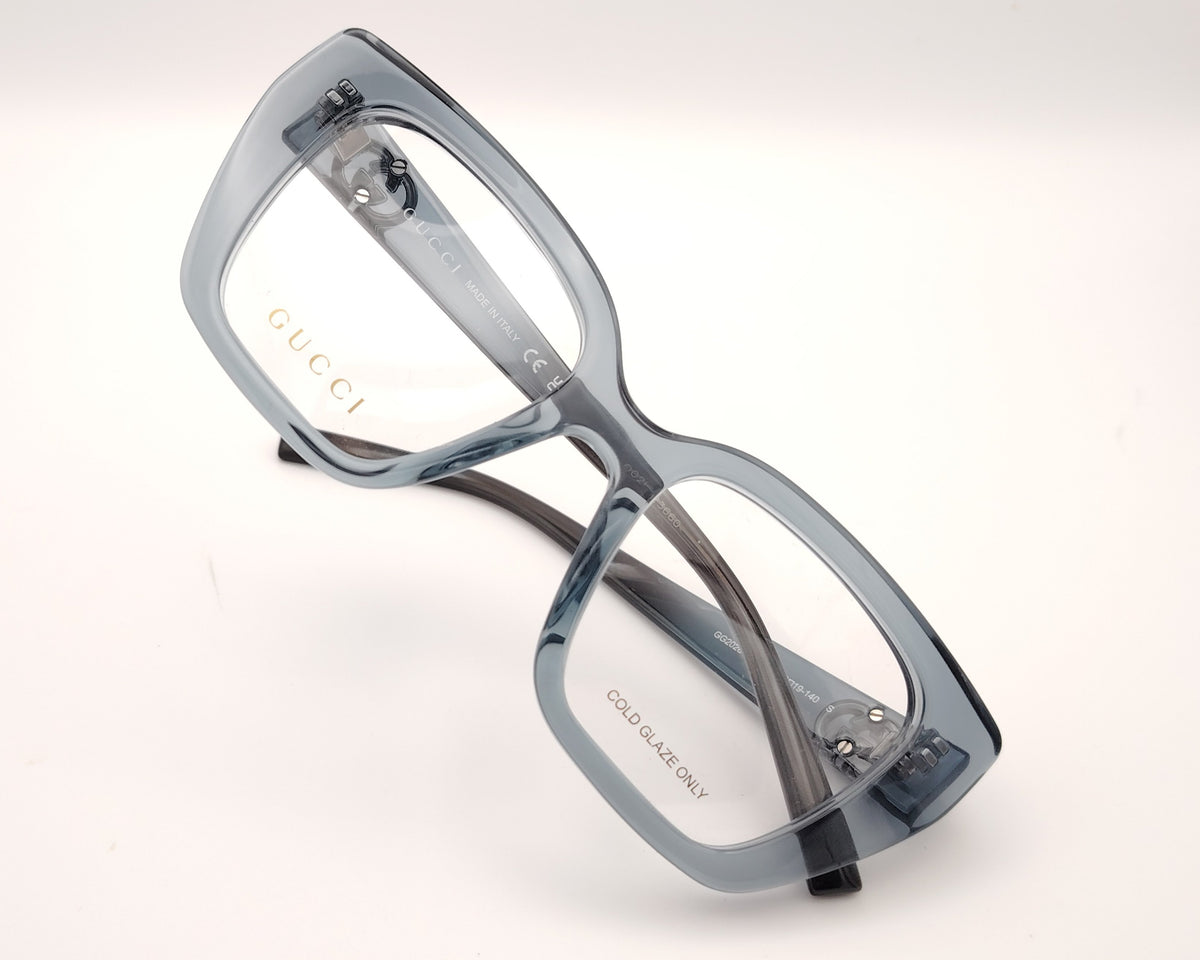 gafas gucci graduadas de acetato translúcido azul grisáceo con montura geométrica y doble g metálica