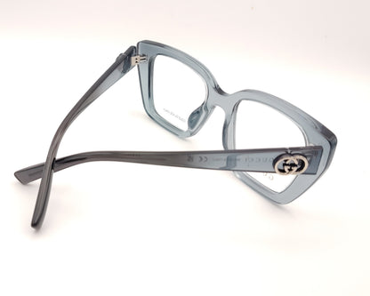 gafas gucci graduadas de acetato translúcido azul grisáceo con montura geométrica y doble g metálica