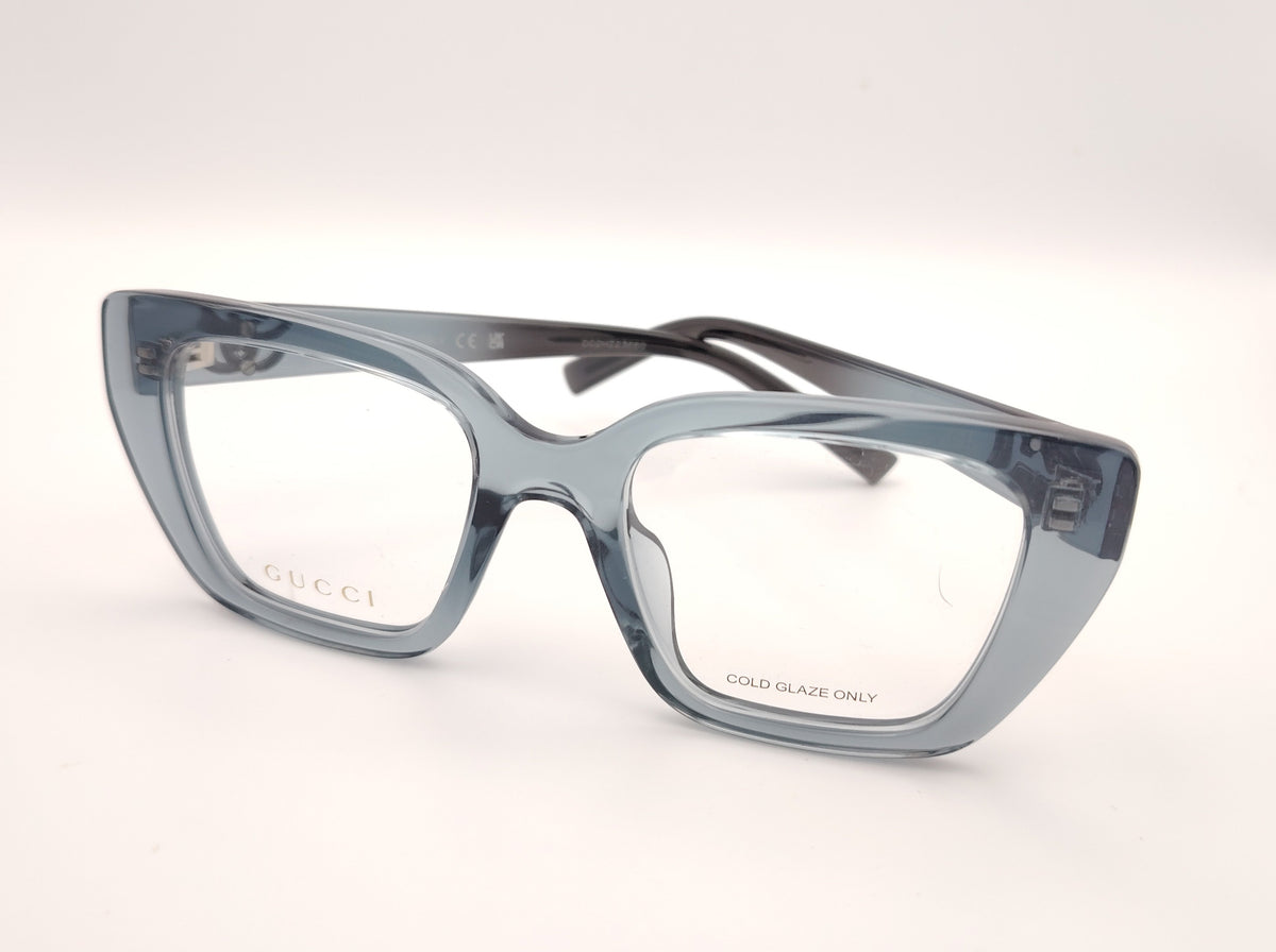 gafas gucci graduadas de acetato translúcido azul grisáceo con montura geométrica y doble g metálica