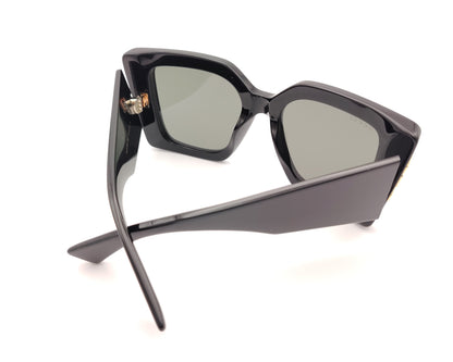 gafas de sol gucci negras oversize cuadradas con logo dorado lateral