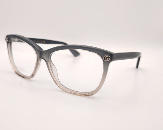 gafas gucci graduadas con montura degradada gris humo y transparente y detalle gg metálico