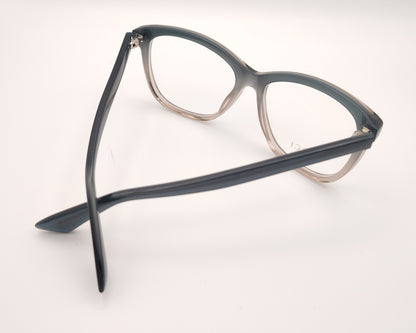 gafas gucci graduadas con montura degradada gris humo y transparente y detalle gg metálico