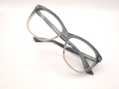 gafas gucci graduadas con montura degradada gris humo y transparente y detalle gg metálico