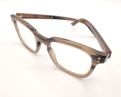 gafas gucci graduadas con montura carey marrón claro y detalles dorados en el frontal y la varilla