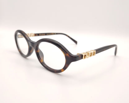 gafas gucci graduadas redondas de acetato carey con logo dorado en las varillas