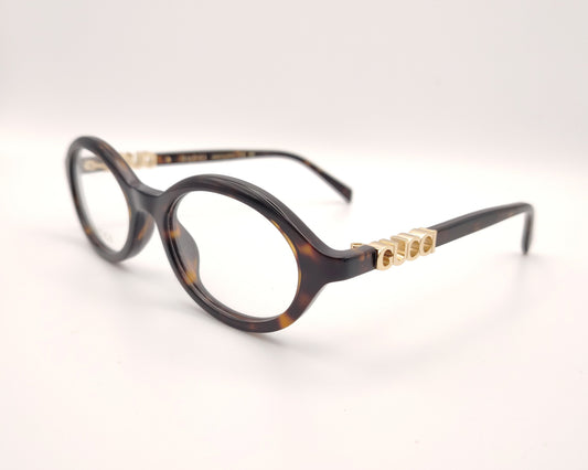 gafas gucci graduadas redondas de acetato carey con logo dorado en las varillas