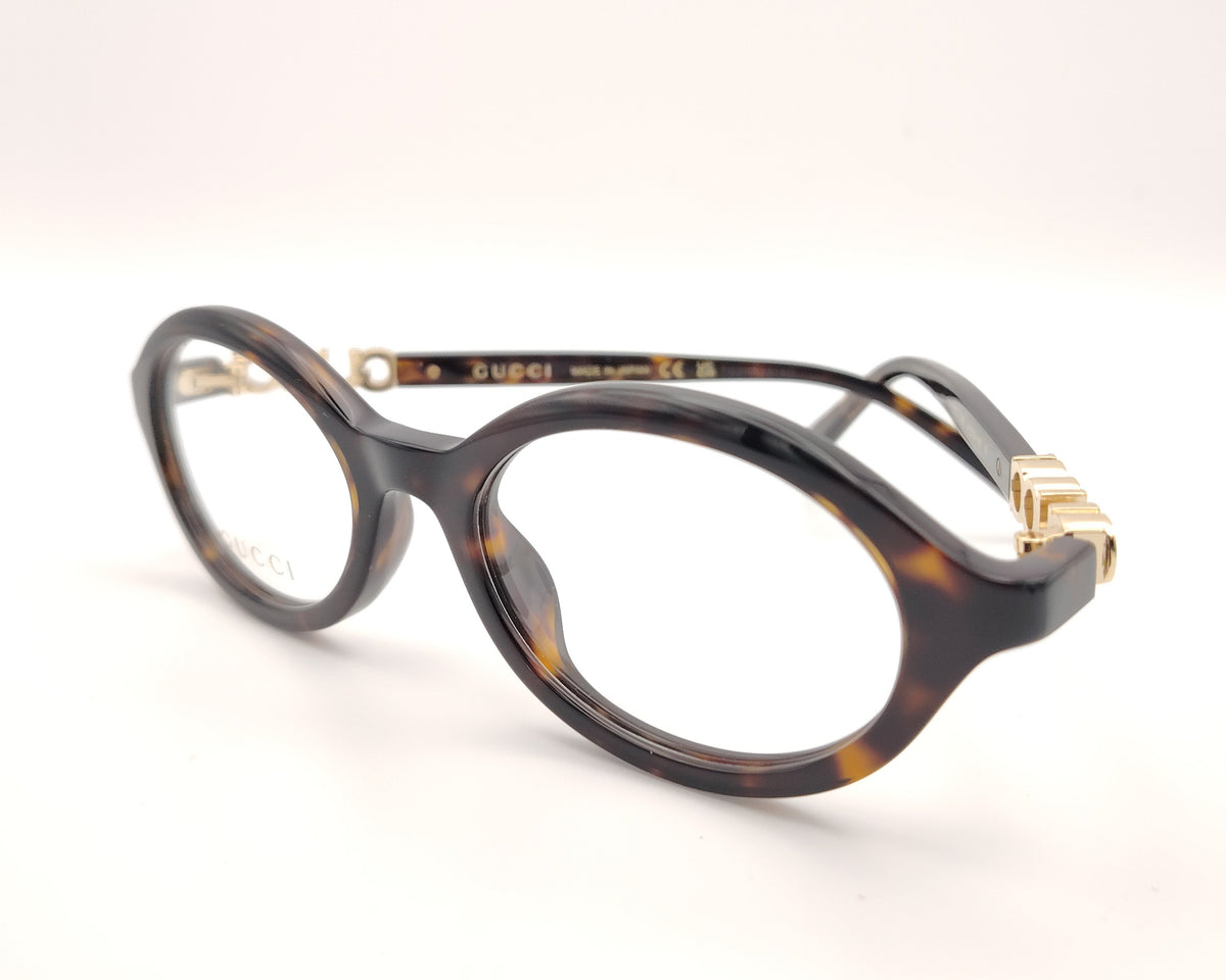 gafas gucci graduadas redondas de acetato carey con logo dorado en las varillas