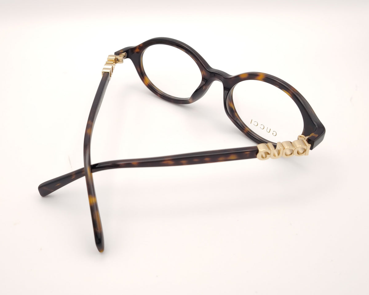 gafas gucci graduadas redondas de acetato carey con logo dorado en las varillas