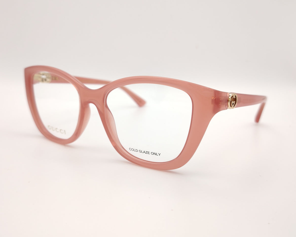 gafas gucci graduadas rosas translúcidas con forma cat eye y detalle gg dorado