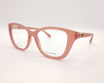 gafas gucci graduadas rosas translúcidas con forma cat eye y detalle gg dorado