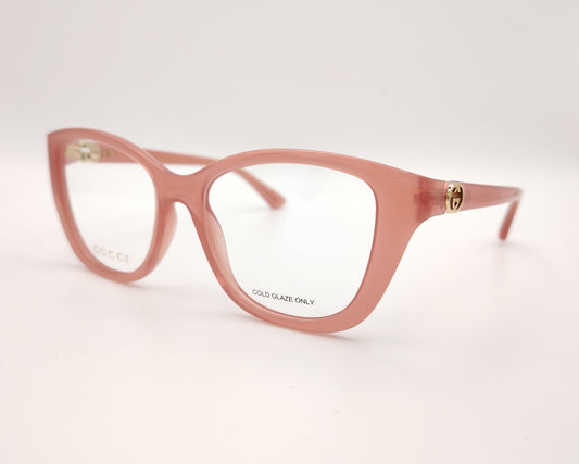 gafas gucci graduadas rosas translúcidas con forma cat eye y detalle gg dorado