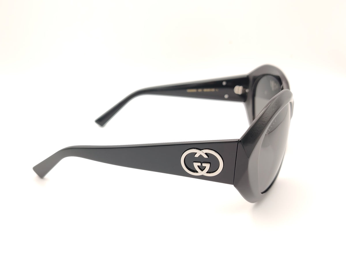 gafas de sol gucci gg2200s oversize de acetato negro con montura redondeada y logo gg metálico en las varillas