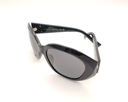 gafas de sol gucci gg2200s oversize de acetato negro con montura redondeada y logo gg metálico en las varillas