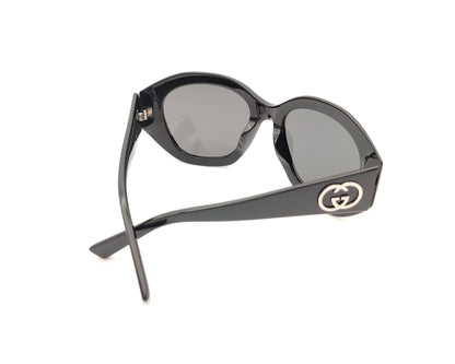 gafas de sol gucci gg2200s oversize de acetato negro con montura redondeada y logo gg metálico en las varillas