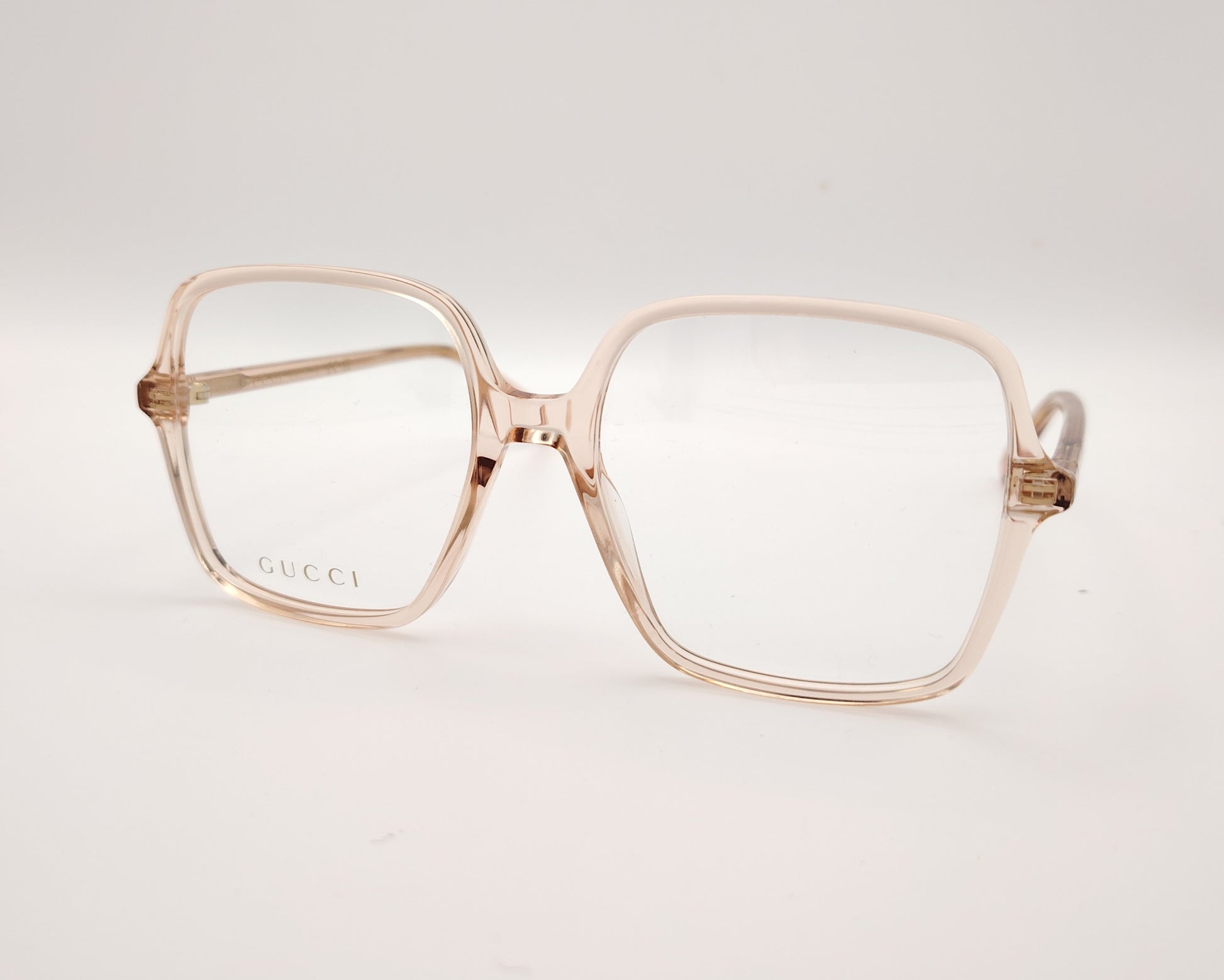 gafas graduadas de oversize con montura cuadrada en tono rosa claro translúcido 