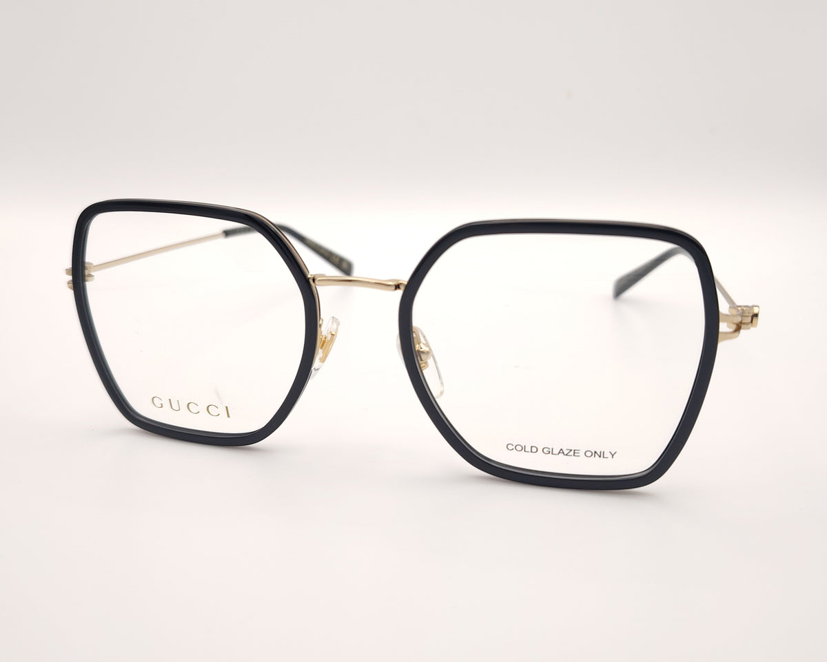 gafas gucci cuadradas con estructura metálica dorada y borde negro brillante