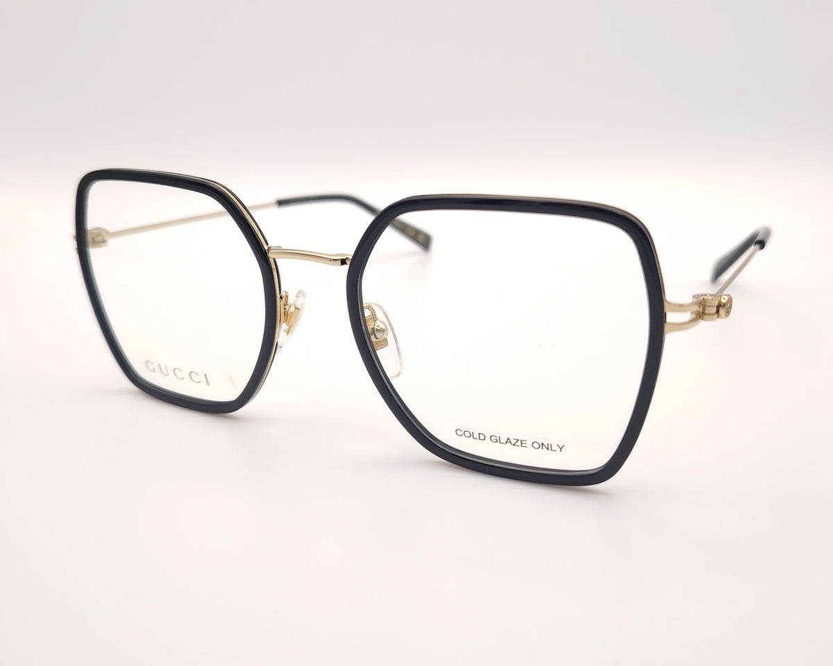 gafas gucci cuadradas con estructura metálica dorada y borde negro brillante
