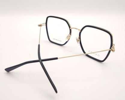 gafas gucci cuadradas con estructura metálica dorada y borde negro brillante