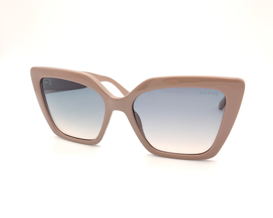 gafas de sol guess para mujer con montura cat-eye de color nude, varillas con pedrería y lentes degradadas