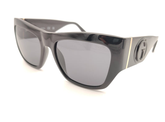 gafas de sol guess negras oversize con logo en relieve y detalle metálico dorado