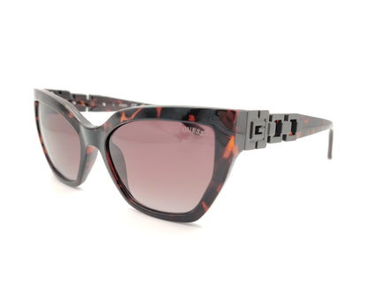 gafas guess carey oscuro con lentes rosas degradadas y detalle geometrico en la varilla