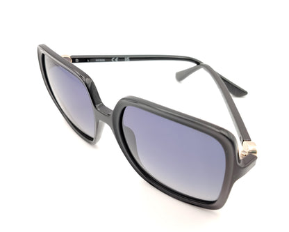 gafas de sol guess negras cuadradas con lentes gris azuladas degradadas y detalle dorado