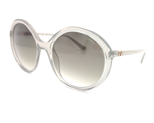 gafas de sol guess redondas con montura verde claro translúcida y lentes verdes degradadas