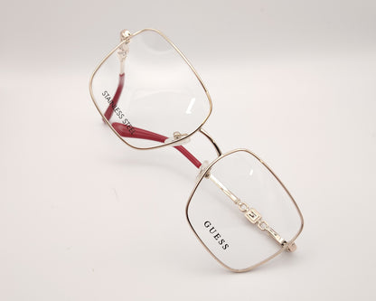 gafas graduadas guess de acero inoxidable doradas con forma cuadrada y terminales rojos