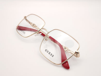 gafas graduadas guess de acero inoxidable doradas con forma cuadrada y terminales rojos