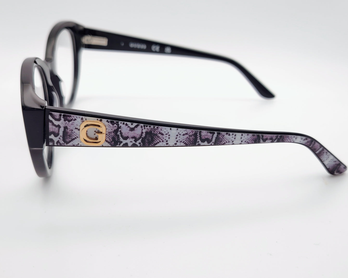 guess gu50127 001 gafas estilo cat eyes redondeadas de acetato en color negro con las varillas en estampado de serpiente gris