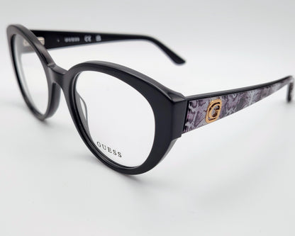 guess gu50127 001 gafas estilo cat eyes redondeadas de acetato en color negro con las varillas en estampado de serpiente gris