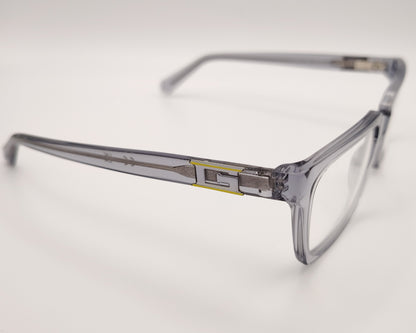 guess gu50132 020 montura elegante en acetato gris transparente con un diseño rectangular, estructura ligera y cómoda perfecta para el día a día detalles metálicos en las varillas que aportan un toque distintivo ideal para un look moderno y versátil