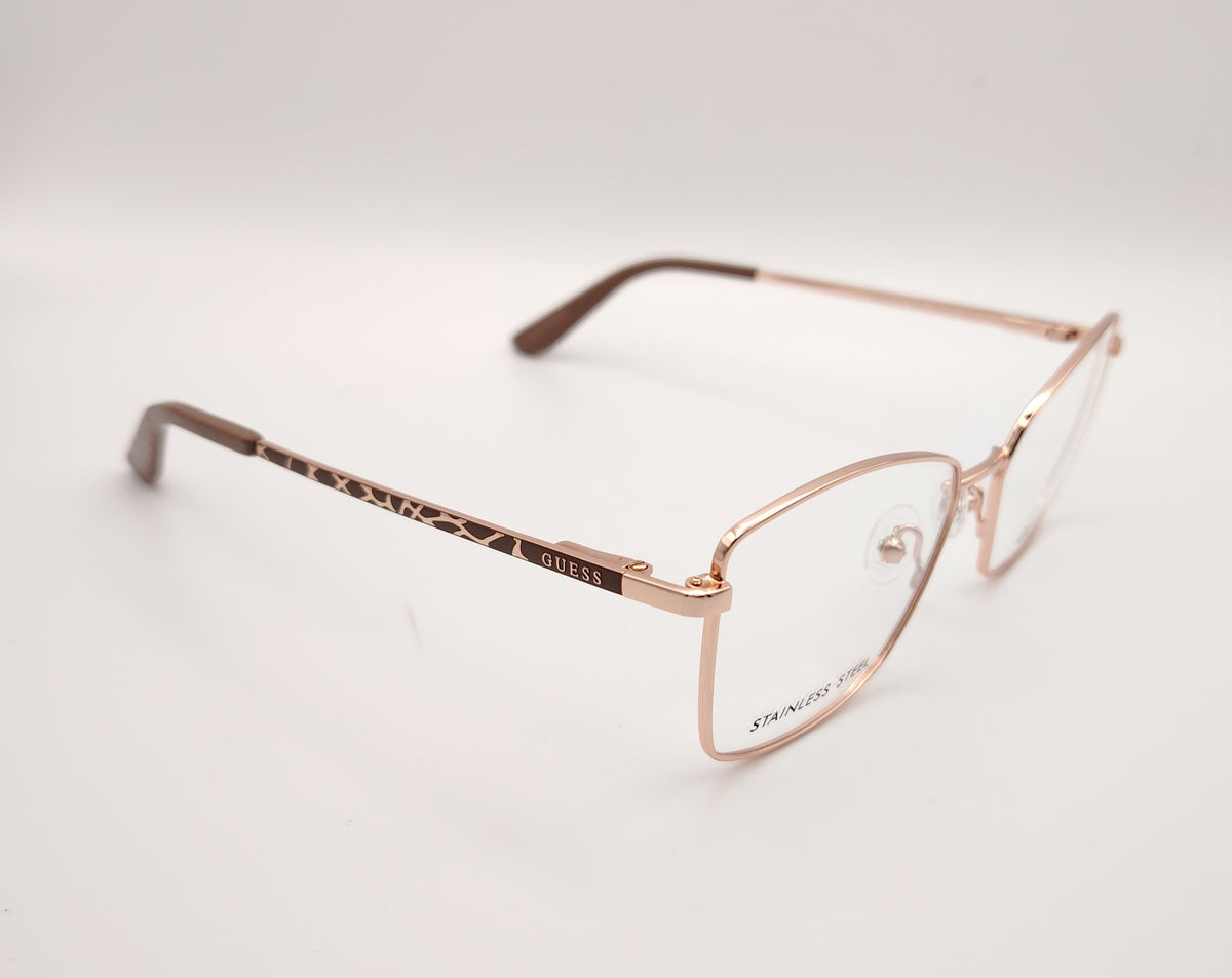 gafas guess graduadas con montura metálica oro rosado y patillas con detalle animal print