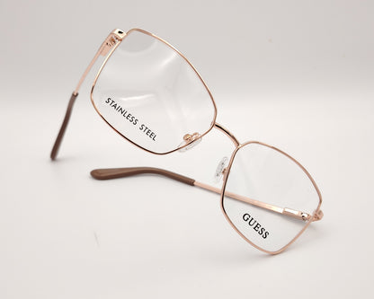gafas guess graduadas con montura metálica oro rosado y patillas con detalle animal print