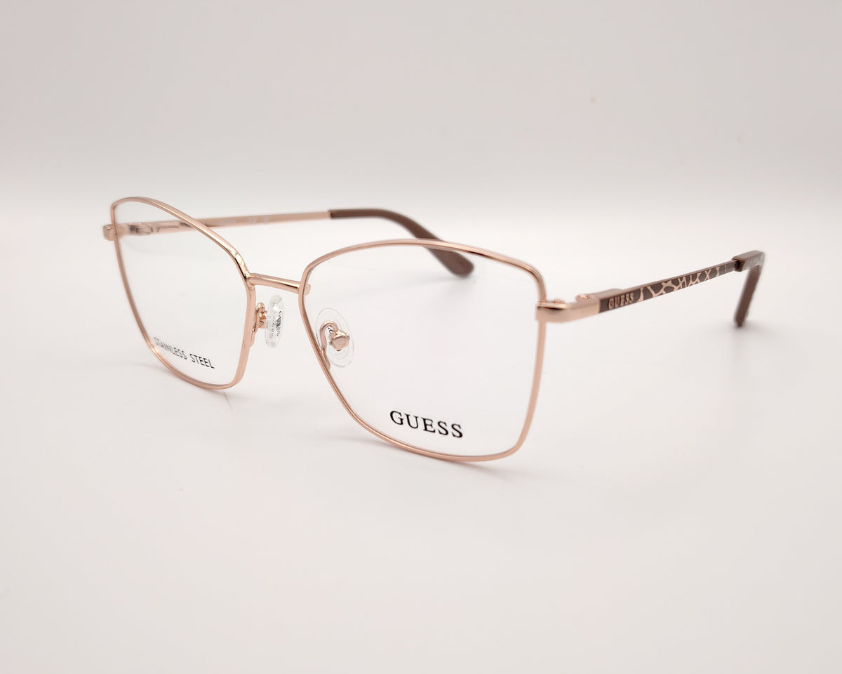 gafas guess graduadas con montura metálica oro rosado y patillas con detalle animal print