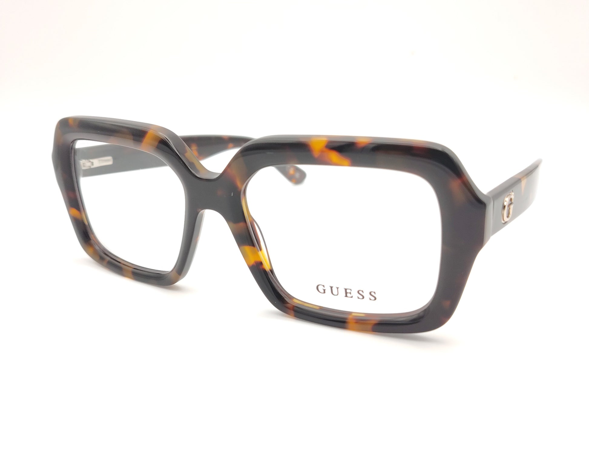 gafas guess cuadradas con montura de pasta carey y detalle metálico en la varilla