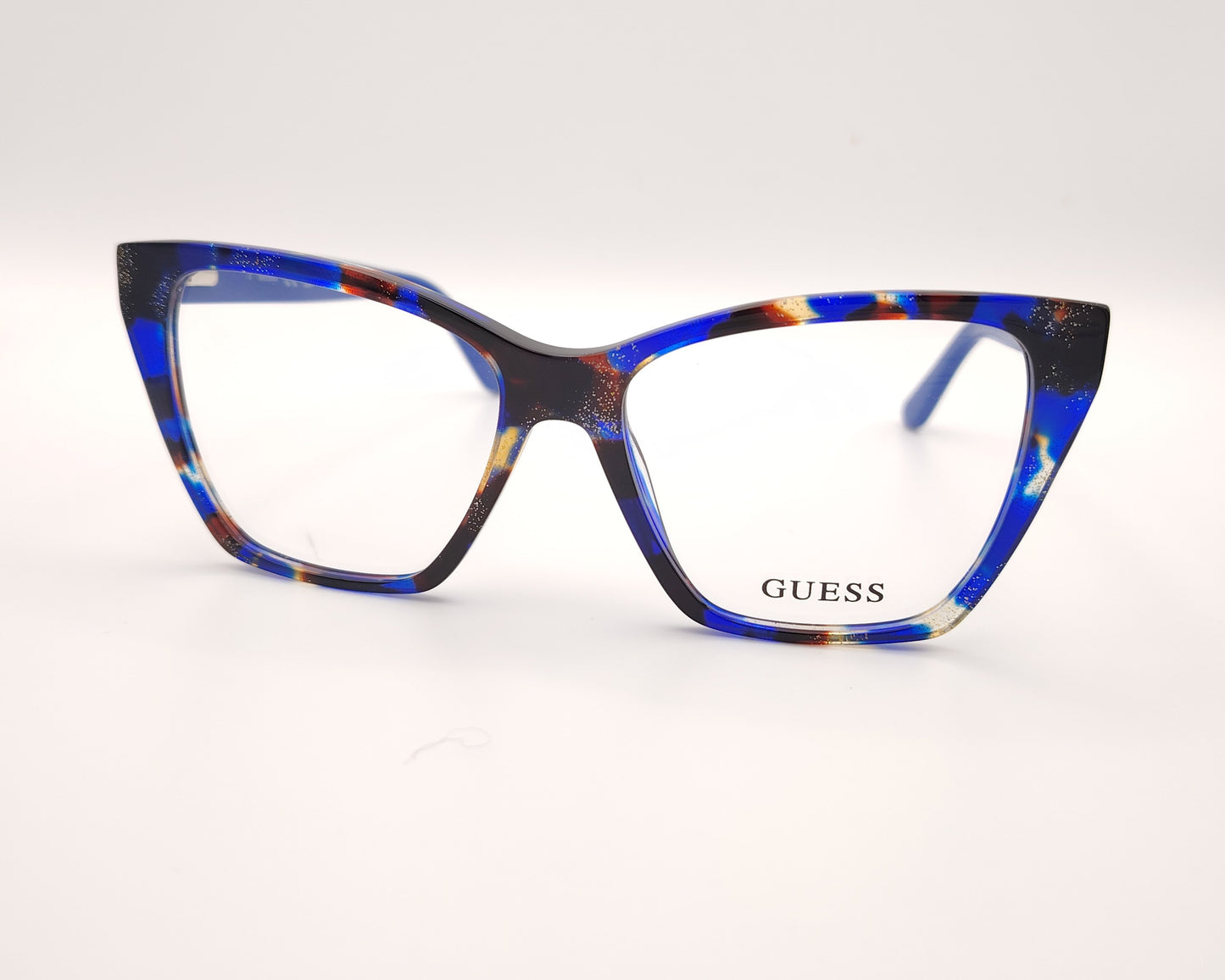 gafas guess cat-eye multicolor con montura brillante en tonos azules y detalles en carey y dorado