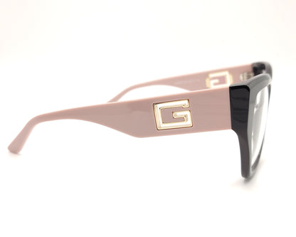 gafas guess negras con patillas rosa empolvado y logo dorado en relieve