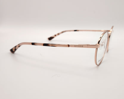 gafas de vista guess con montura redonda de metal en color oro rosa y terminales de carey