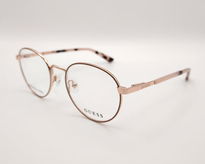 gafas de vista guess con montura redonda de metal en color oro rosa y terminales de carey