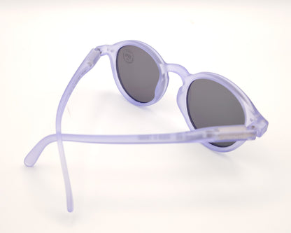 gafas de sol polarizadas para niños en color lila traslúcido con lentes oscuras