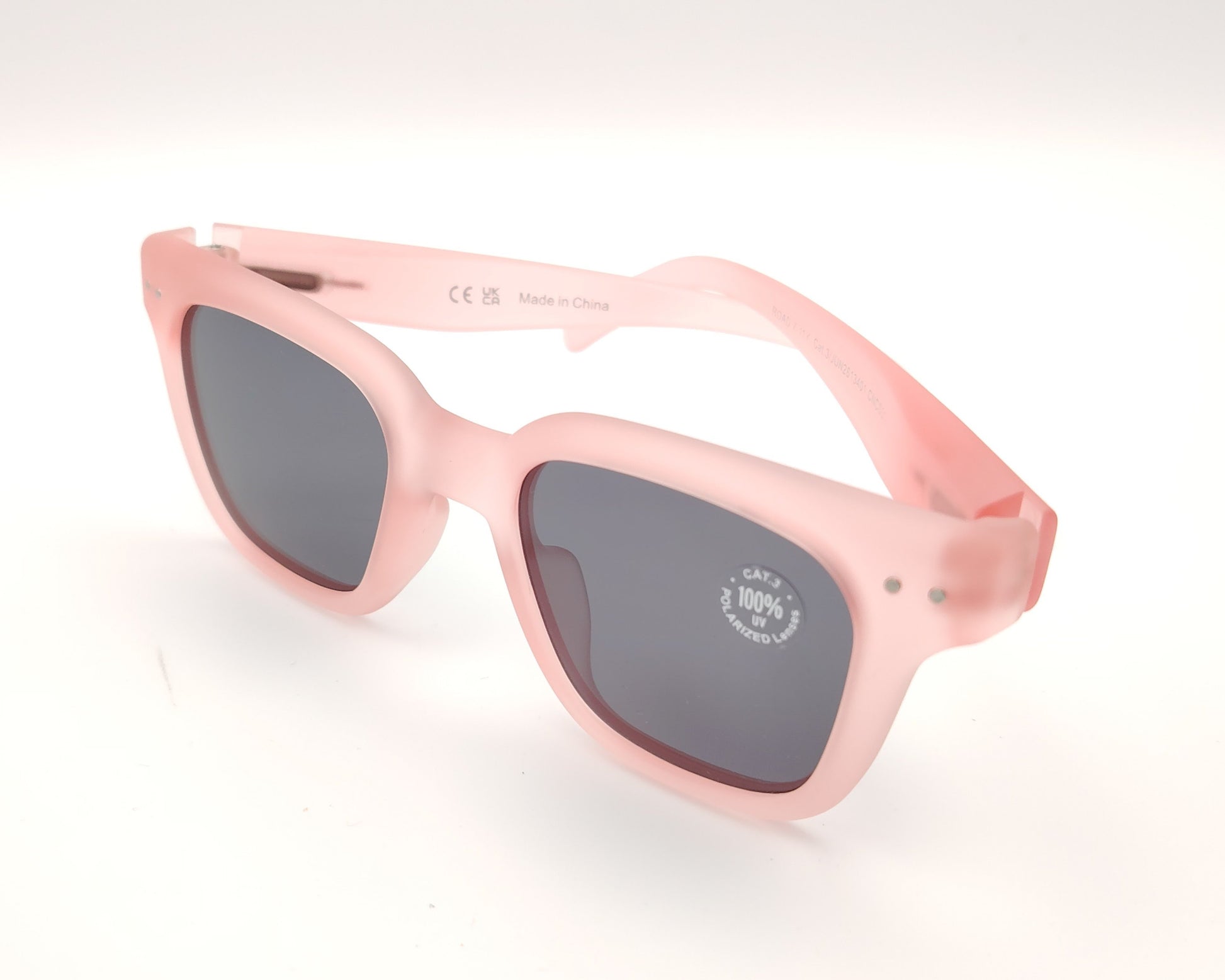 gafas de sol infantiles izipizi polarizadas en color rosa claro con lentes oscuras