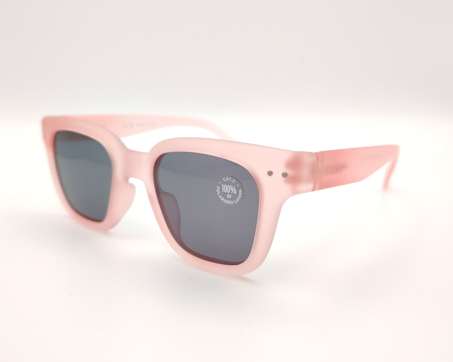 gafas de sol infantiles izipizi polarizadas en color rosa claro con lentes oscuras