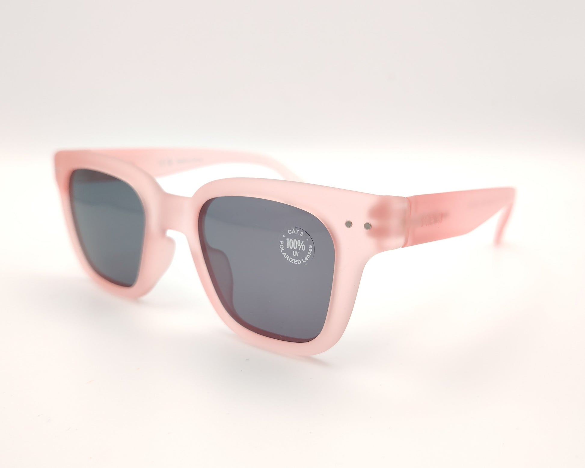 gafas de sol infantiles izipizi polarizadas en color rosa claro con lentes oscuras