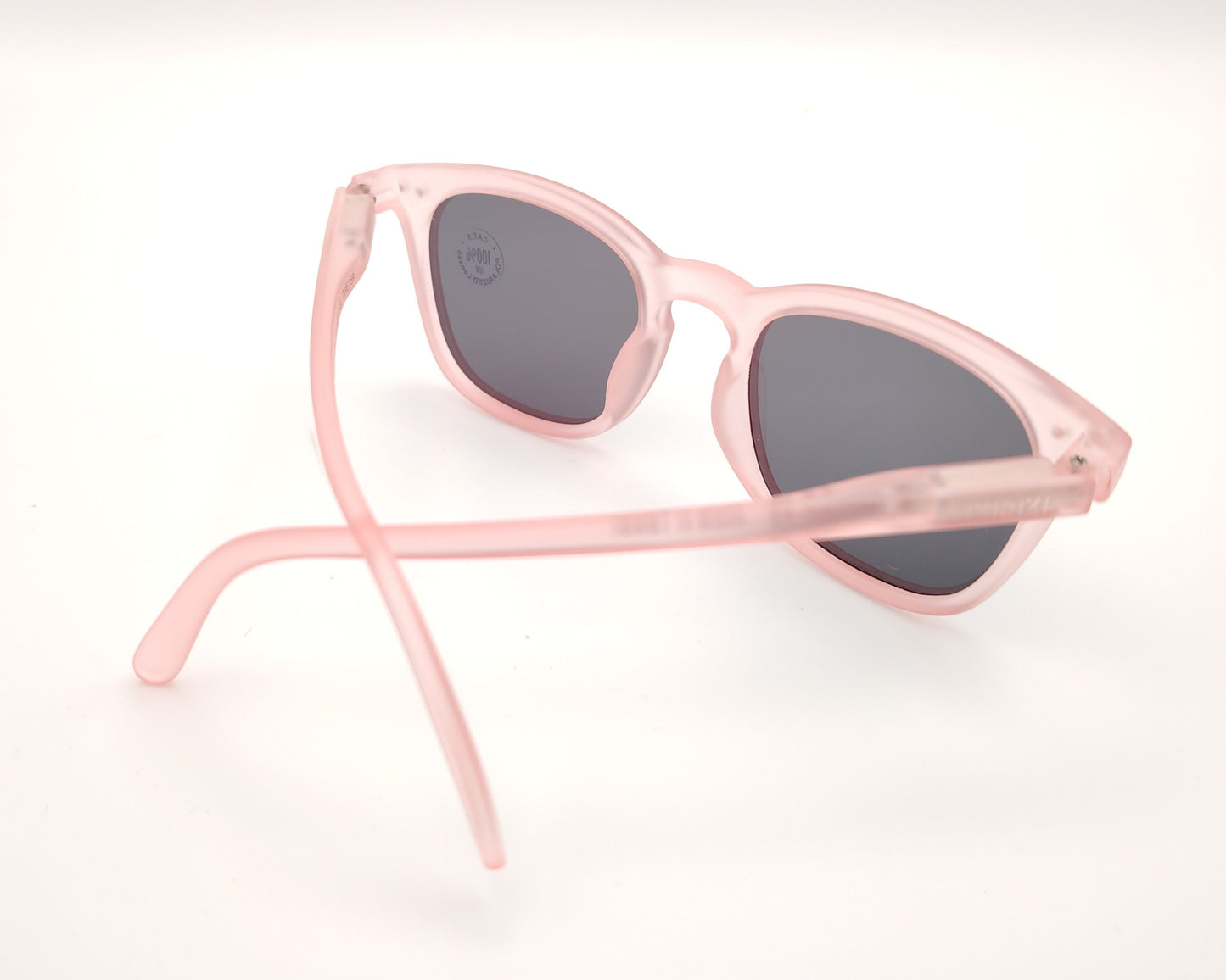 gafas de sol infantiles izipizi polarizadas en color rosa con lentes oscuras