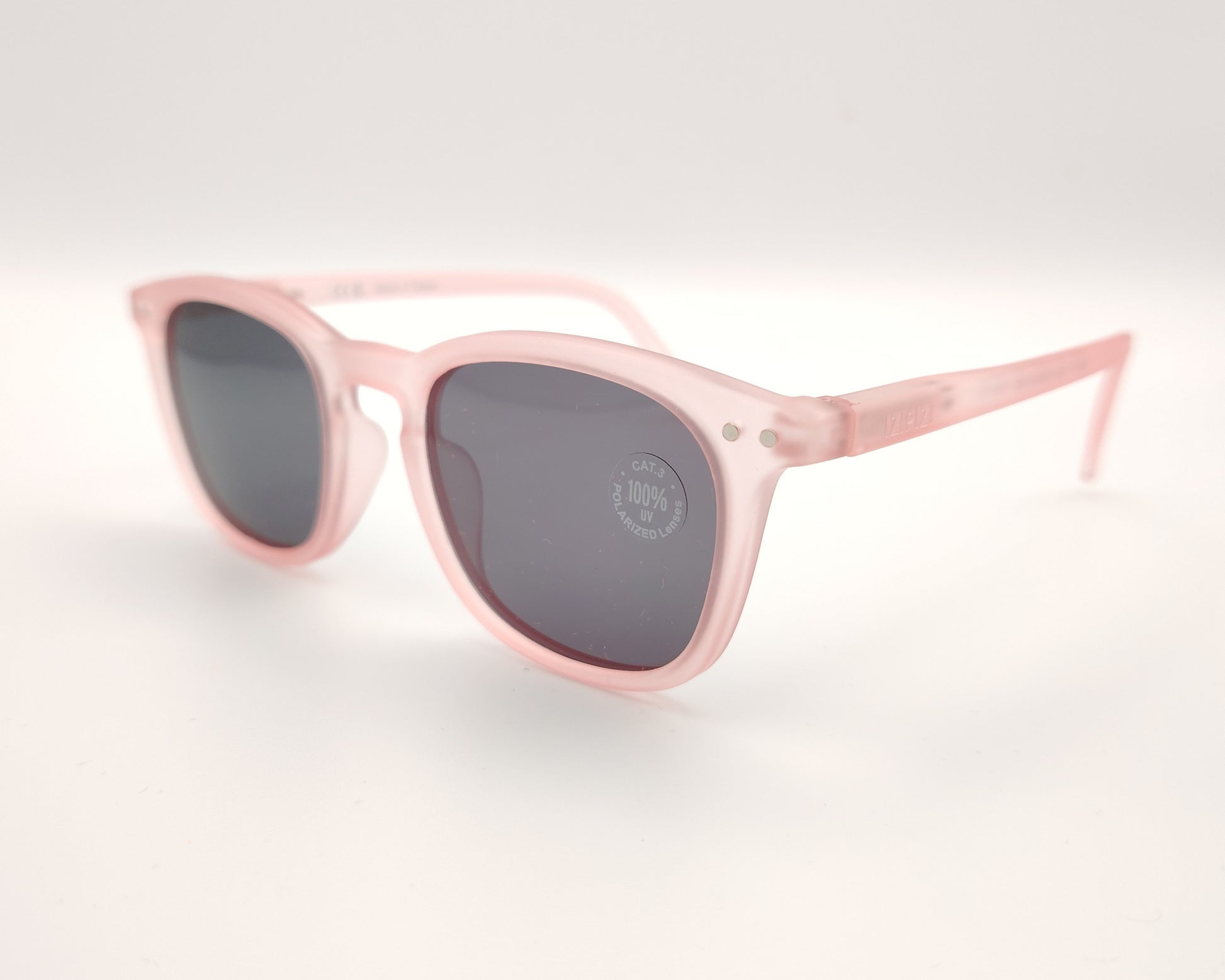 gafas de sol infantiles izipizi polarizadas en color rosa con lentes oscuras
